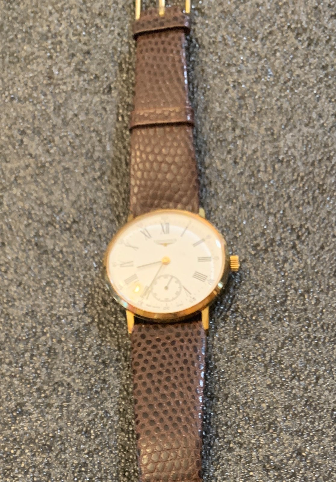 A Genuine LONGINE man's watch