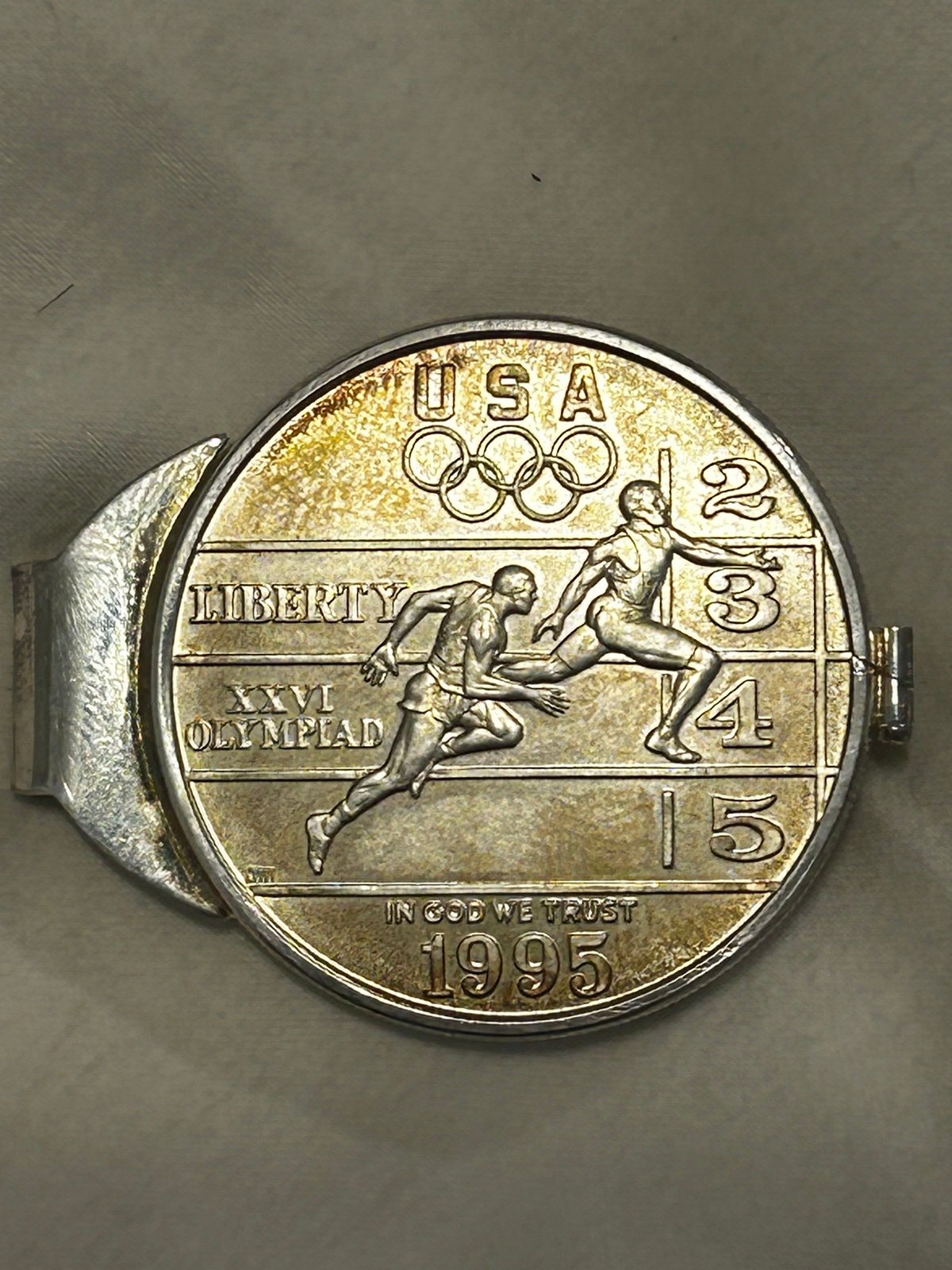 Money clip with 1995D silver dollar