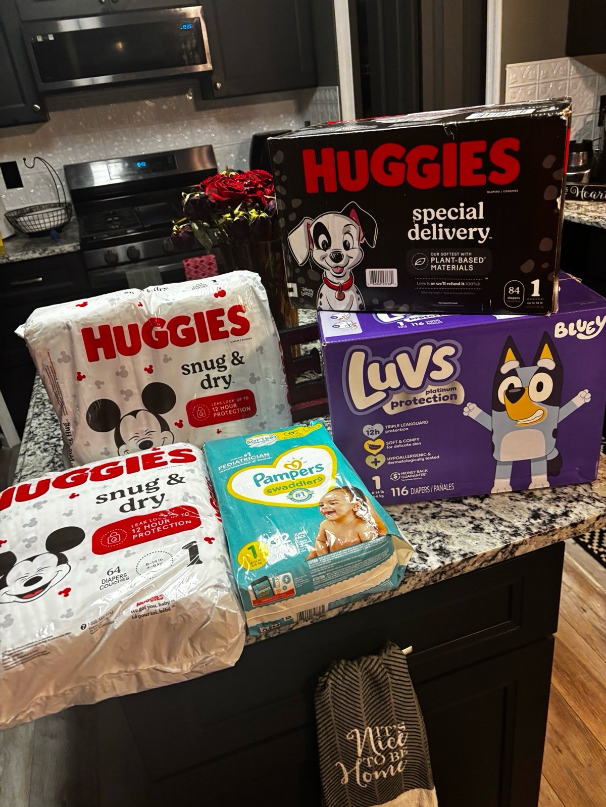 Bundle of five box and bags of pampers