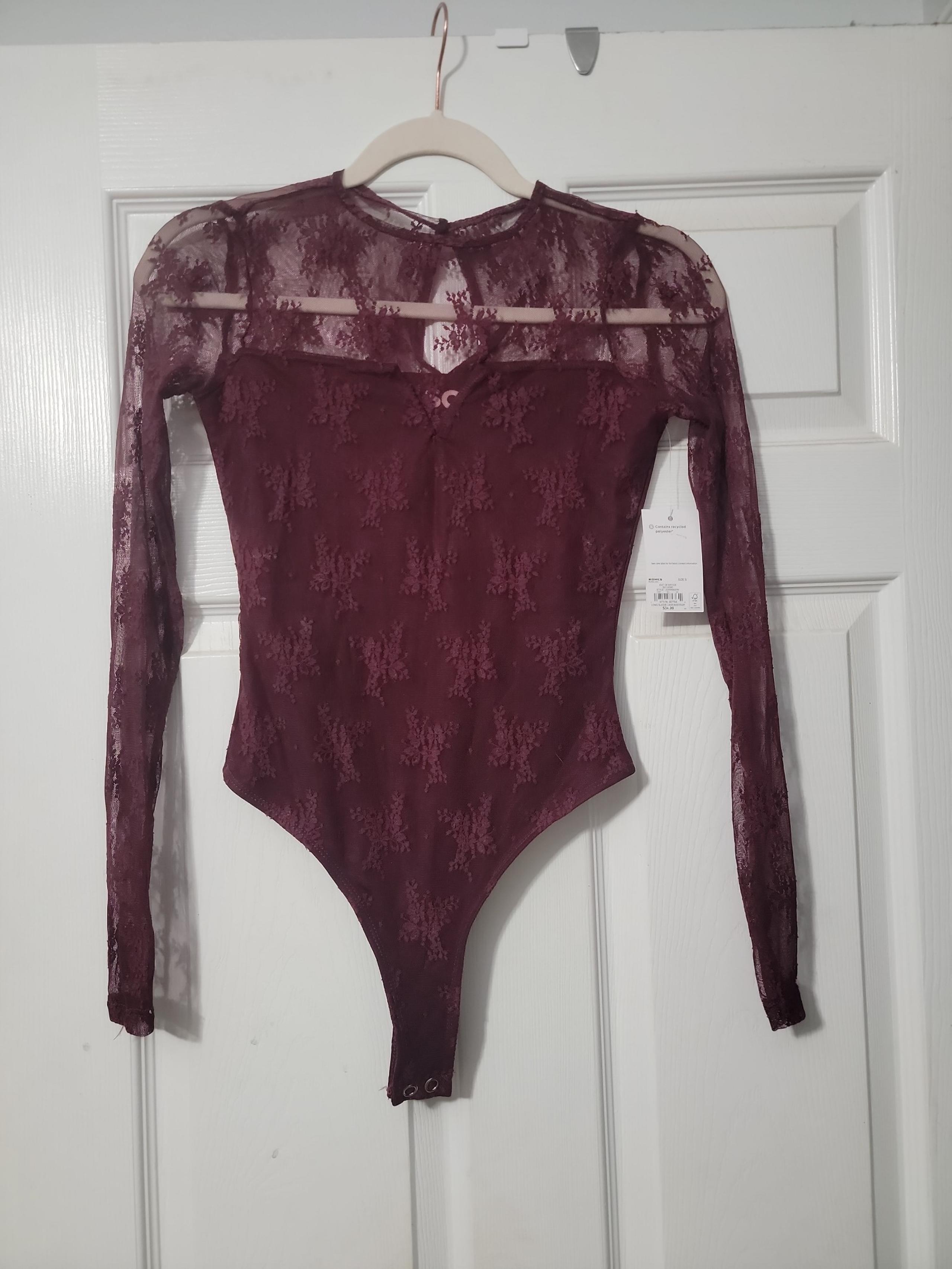Women's lace bodysuit by So. Size small.