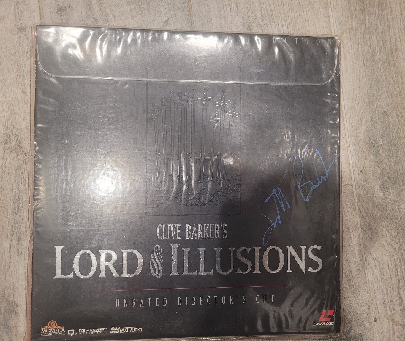 The Lord Of Illusion laser Disk signed by Scott Bakula