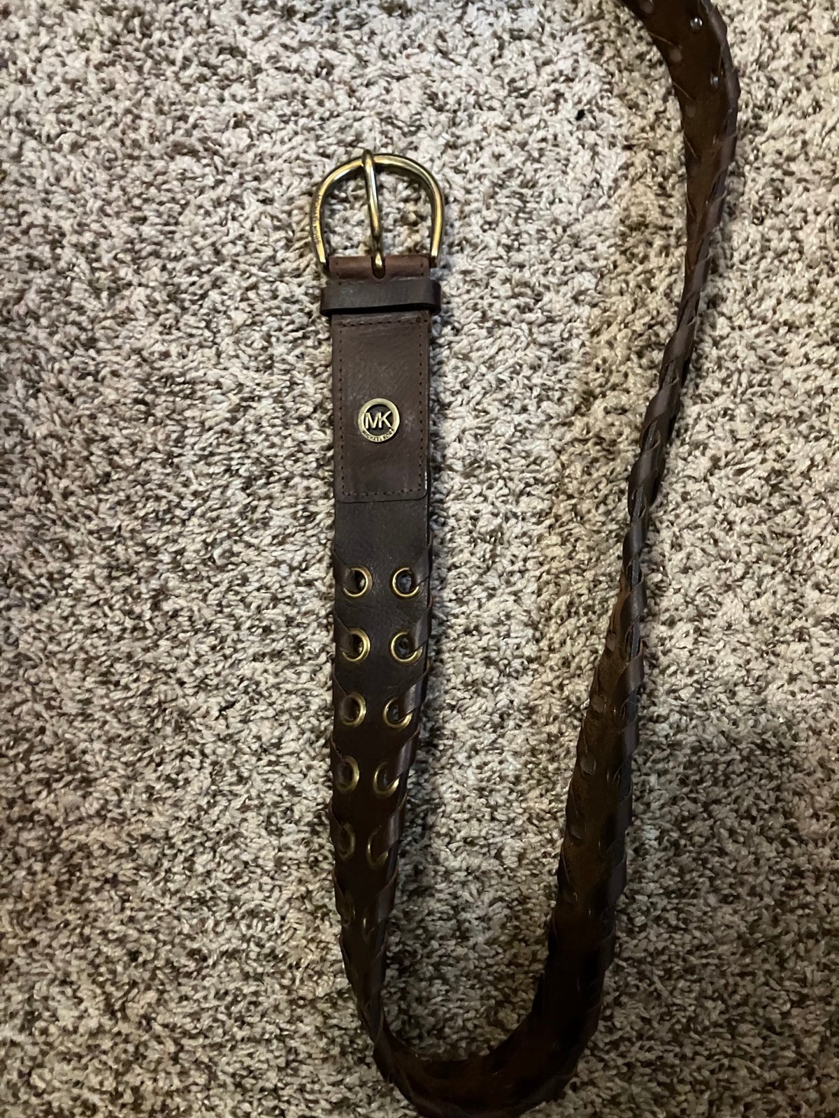 Michael Kors leather and gold grommet belt, 47”