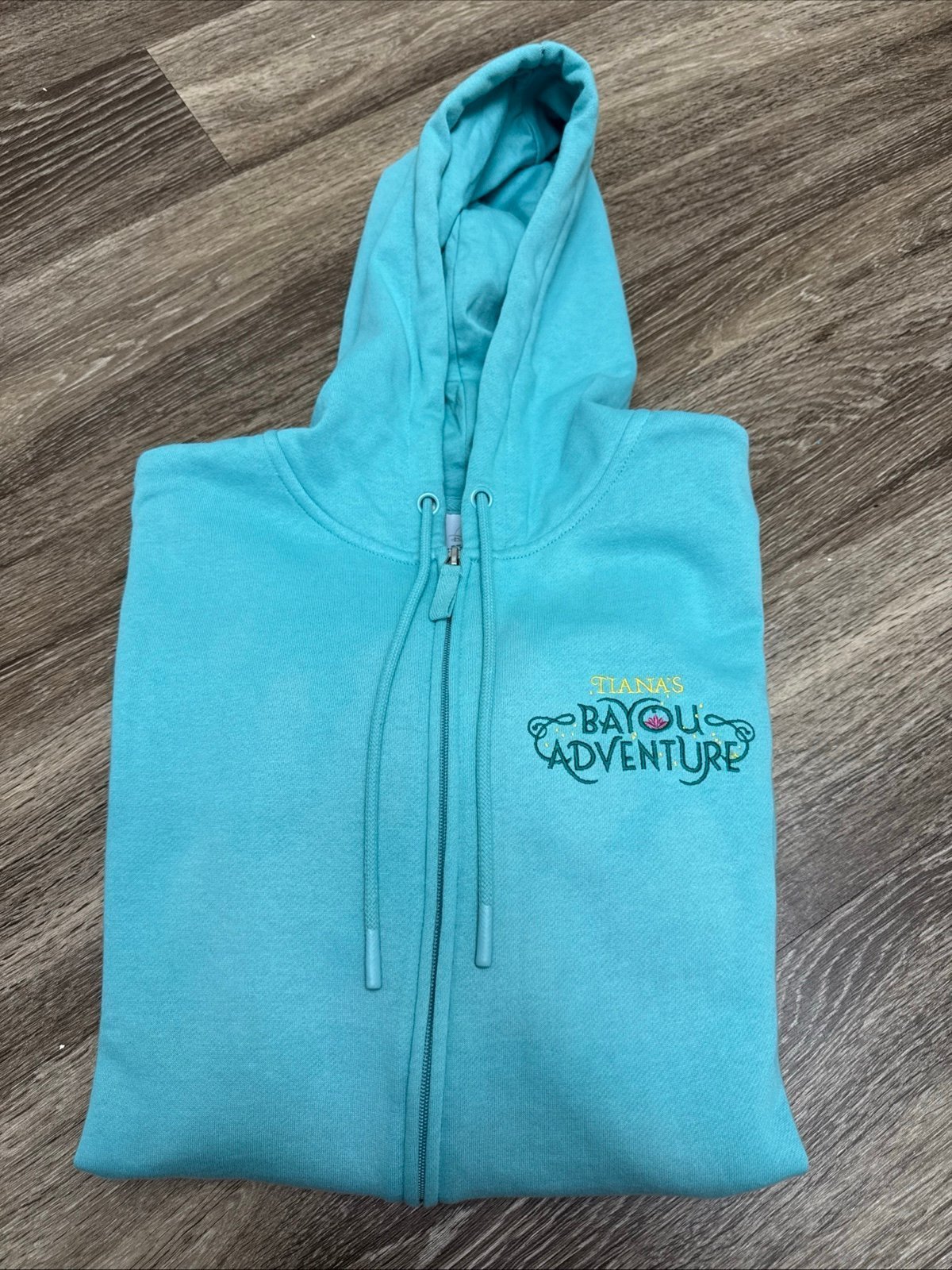 Disney Parks Tiana Bayou Adventure “Let’s Get To The Party” Sweatshirt. Small