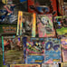 11 Pokémon tins with great cards, Pokémon sleeves, giant cards and more!!!! READ