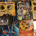 11 Pokémon tins with great cards, Pokémon sleeves, giant cards and more!!!! READ