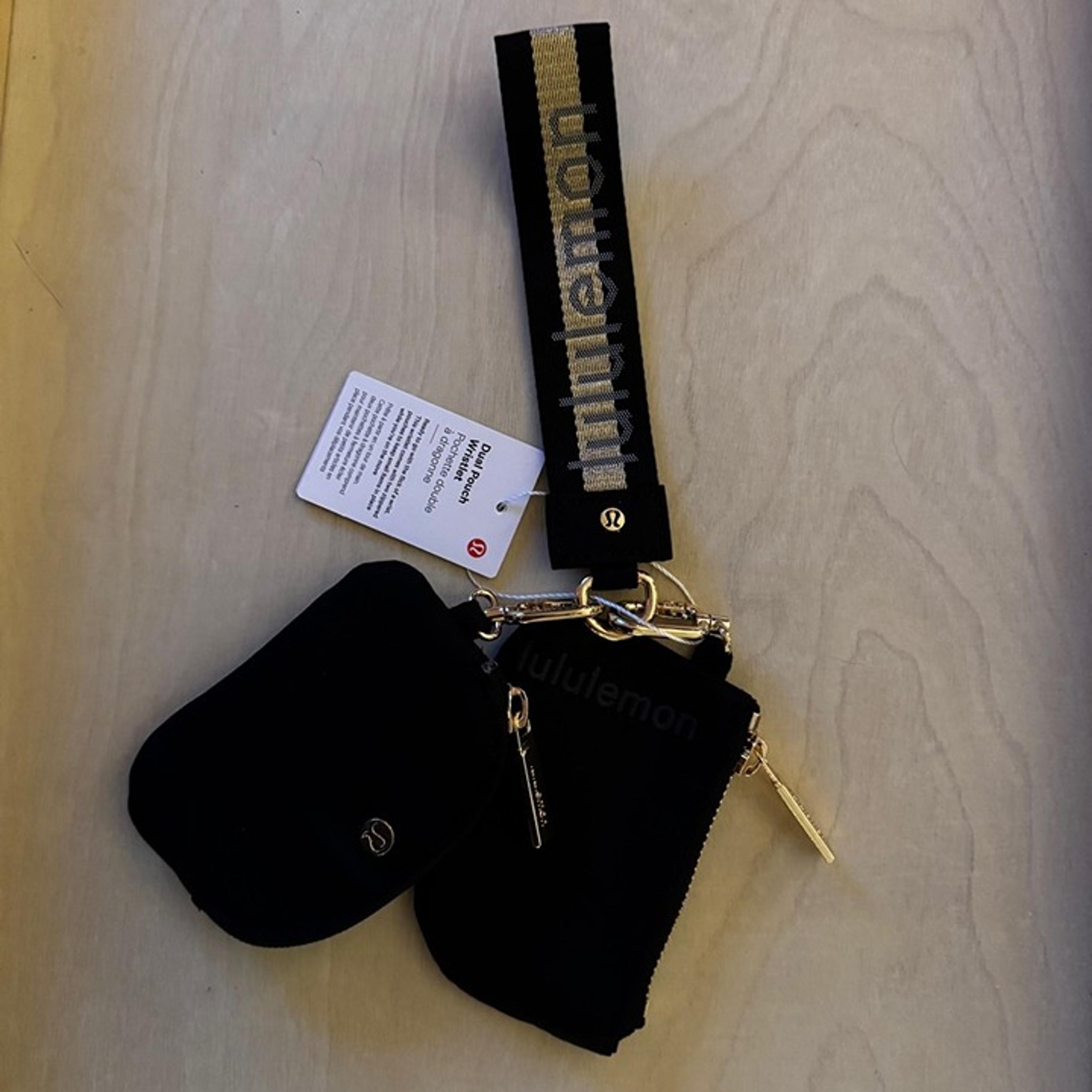 NWT - Lululemon Dual Pouch Wristlet Black with Gold Hardware and Logo - lululemon athletica