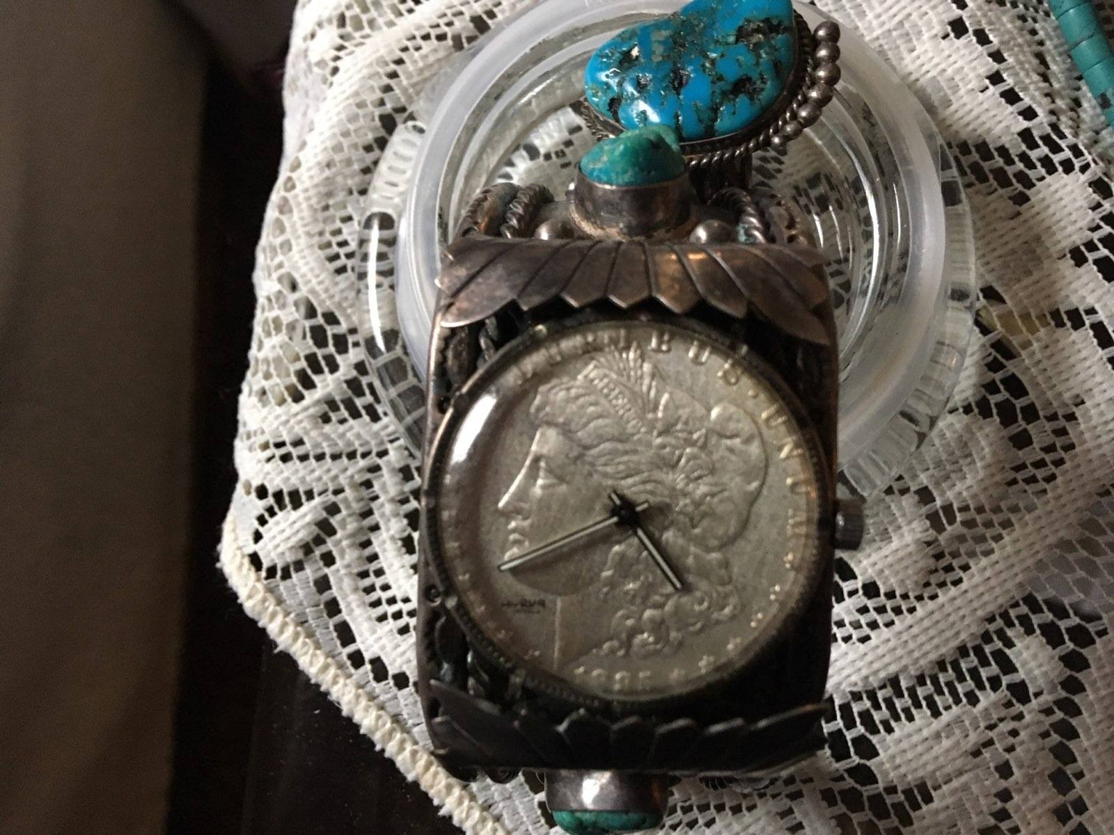 Antique silver dollar watch
