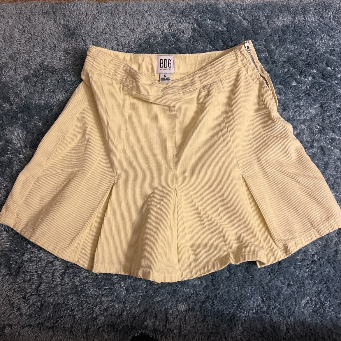 urban outfitter's y2k beige mini skirt