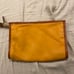Beautiful lambskin caramel colored cosmetic bag or clutch with linen lining