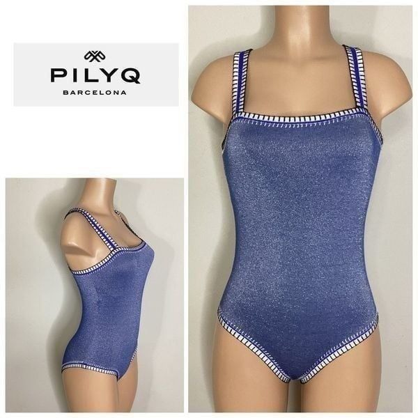 New. Pilyq Platinum silver blue crochet one piece. Size small. Retails 168