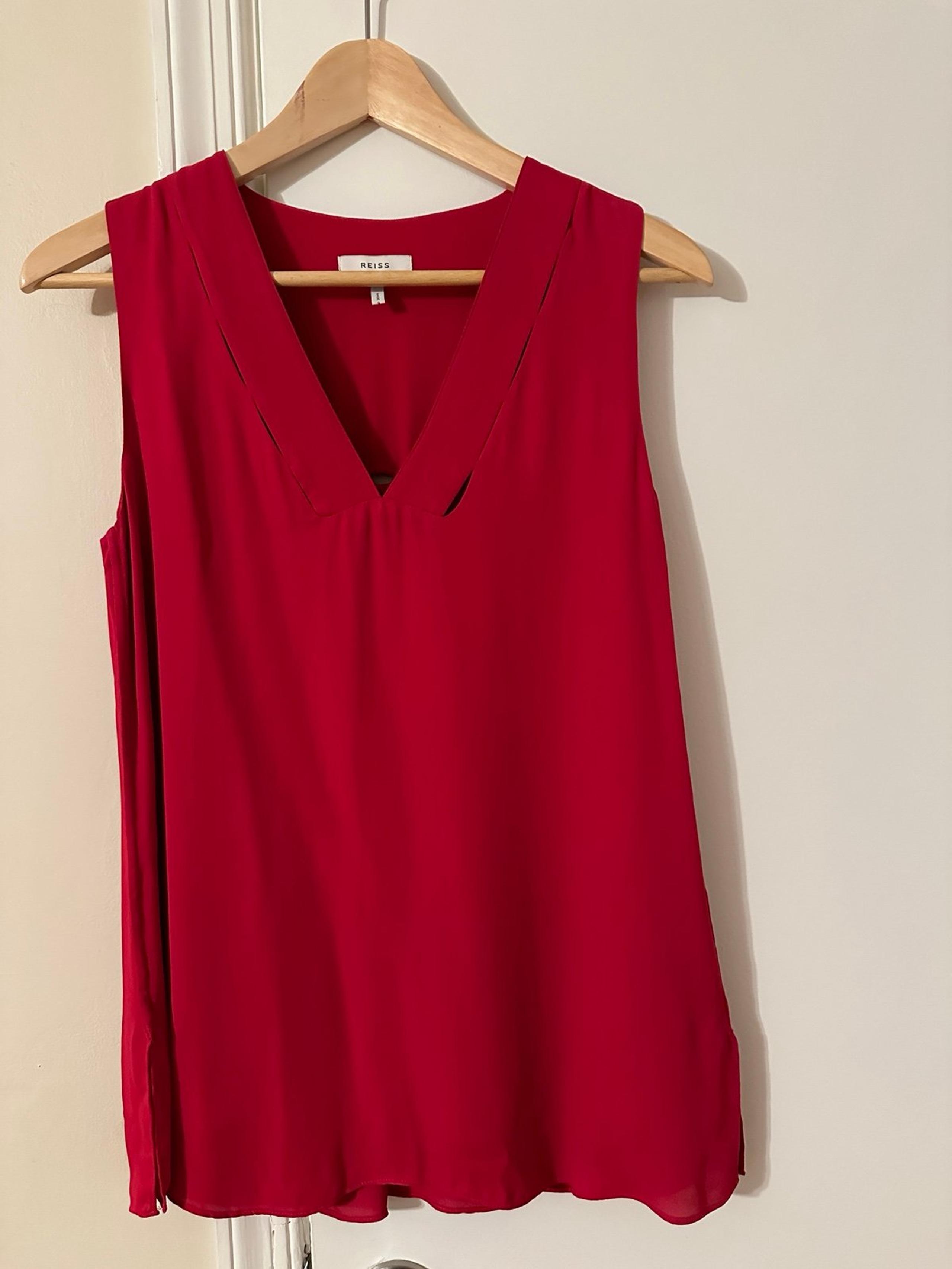 Red Sleeveless Blouse