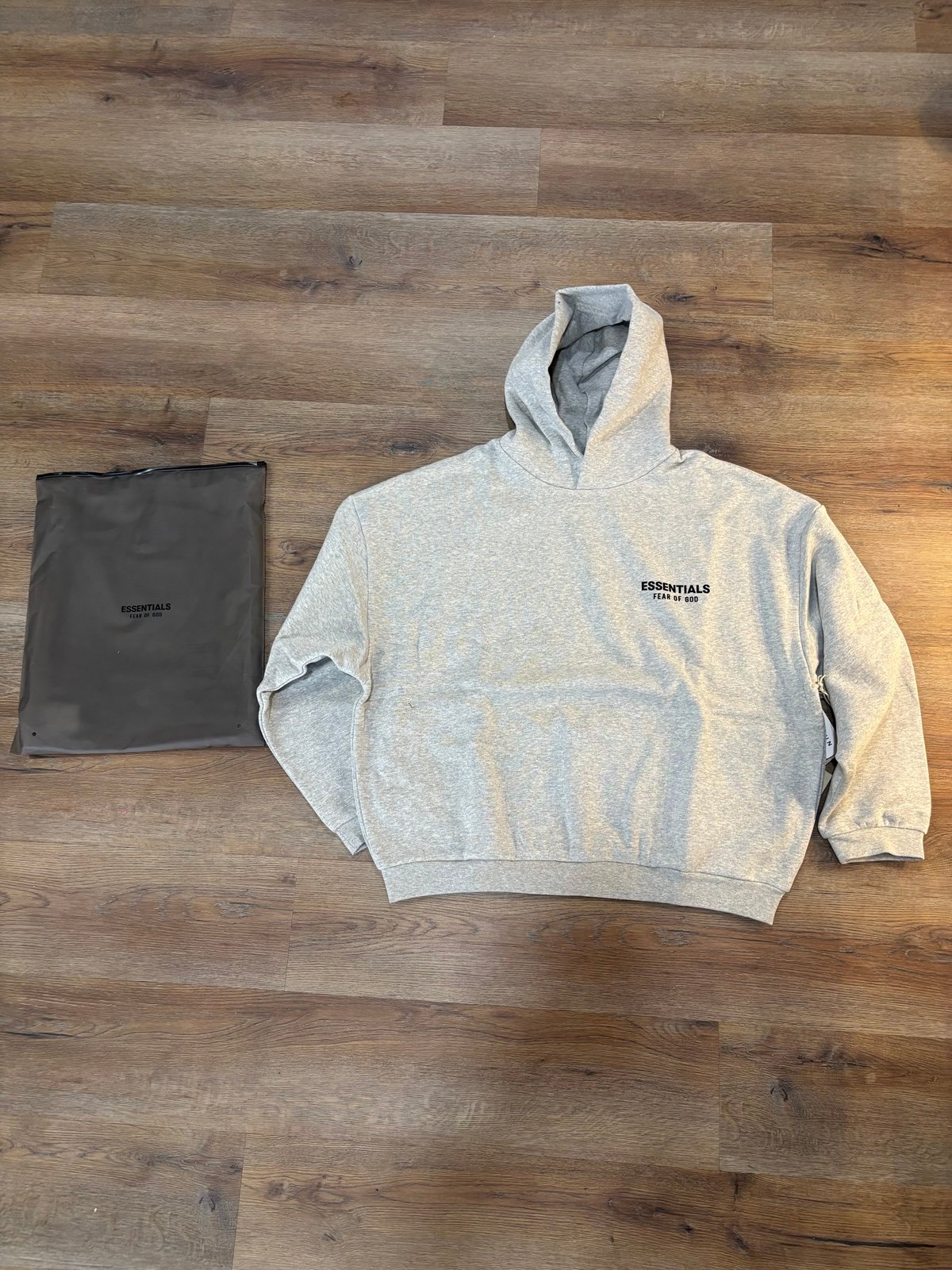 Fear of God Essentials Men’s Light Heather Gray Hoodie