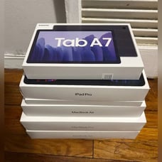 Apple, MacBook Pro, And Samsung Tab A7 Empty Boxes