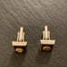 Vintage Anson Rotary International Silver Tone Cufflinks on Burgundy Background