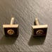 Vintage Anson Rotary International Silver Tone Cufflinks on Burgundy Background