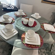 Elevate your dining experience with the Gibson Home Everyday Square White Cerami