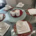 Elevate your dining experience with the Gibson Home Everyday Square White Cerami