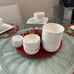 Elevate your dining experience with the Gibson Home Everyday Square White Cerami