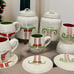 RAE DUNN ELF FEET CANISTER, MUG AND PLATE SET (will divide)
