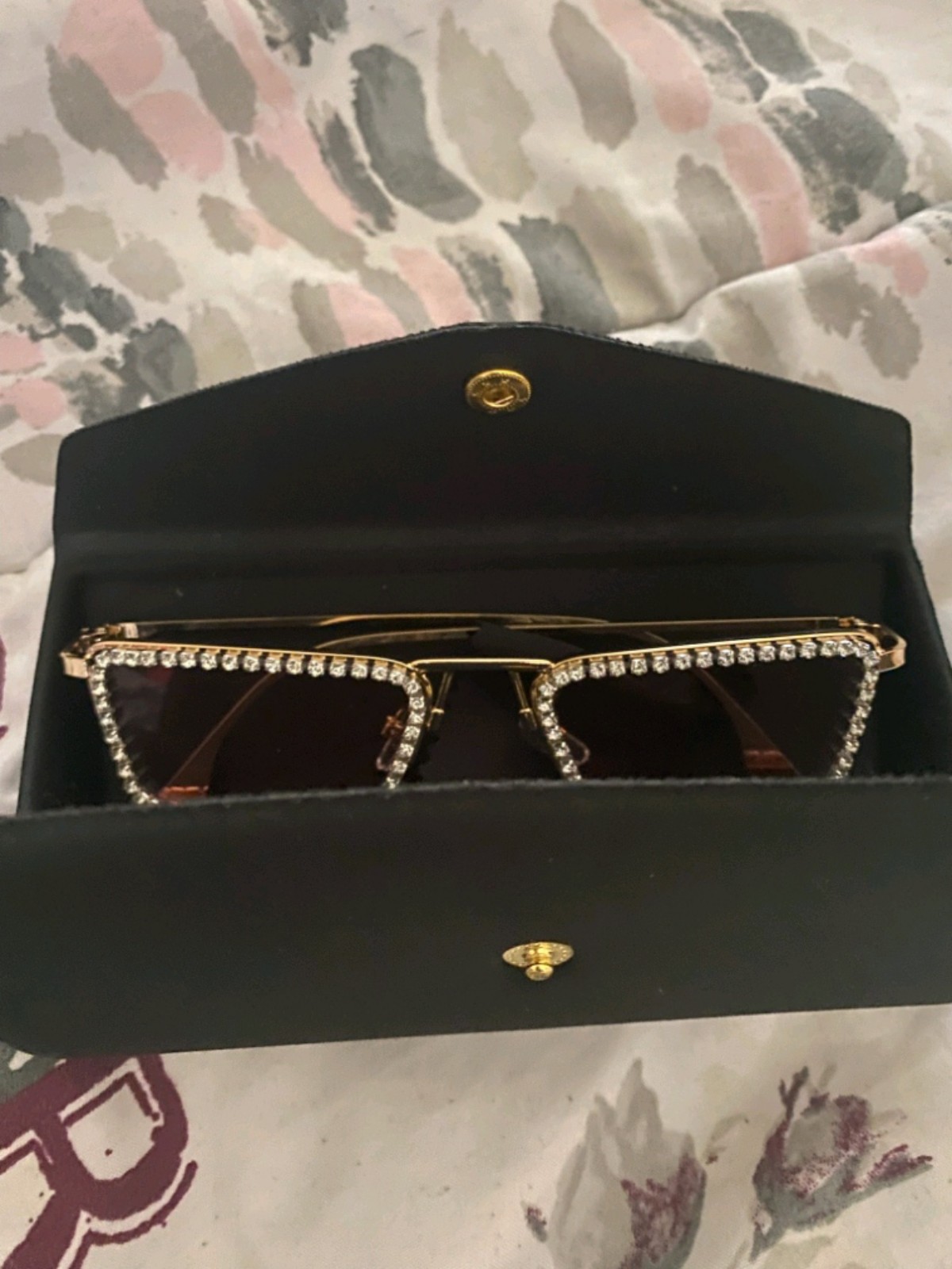 Women's sparkly glasses.