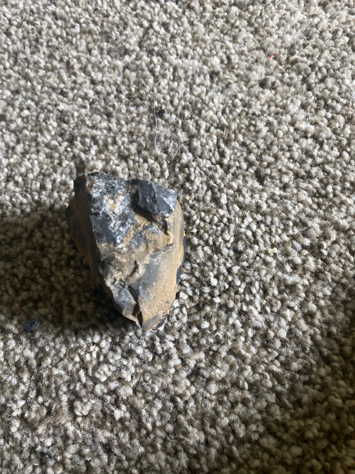 Brown crystal with very little detail