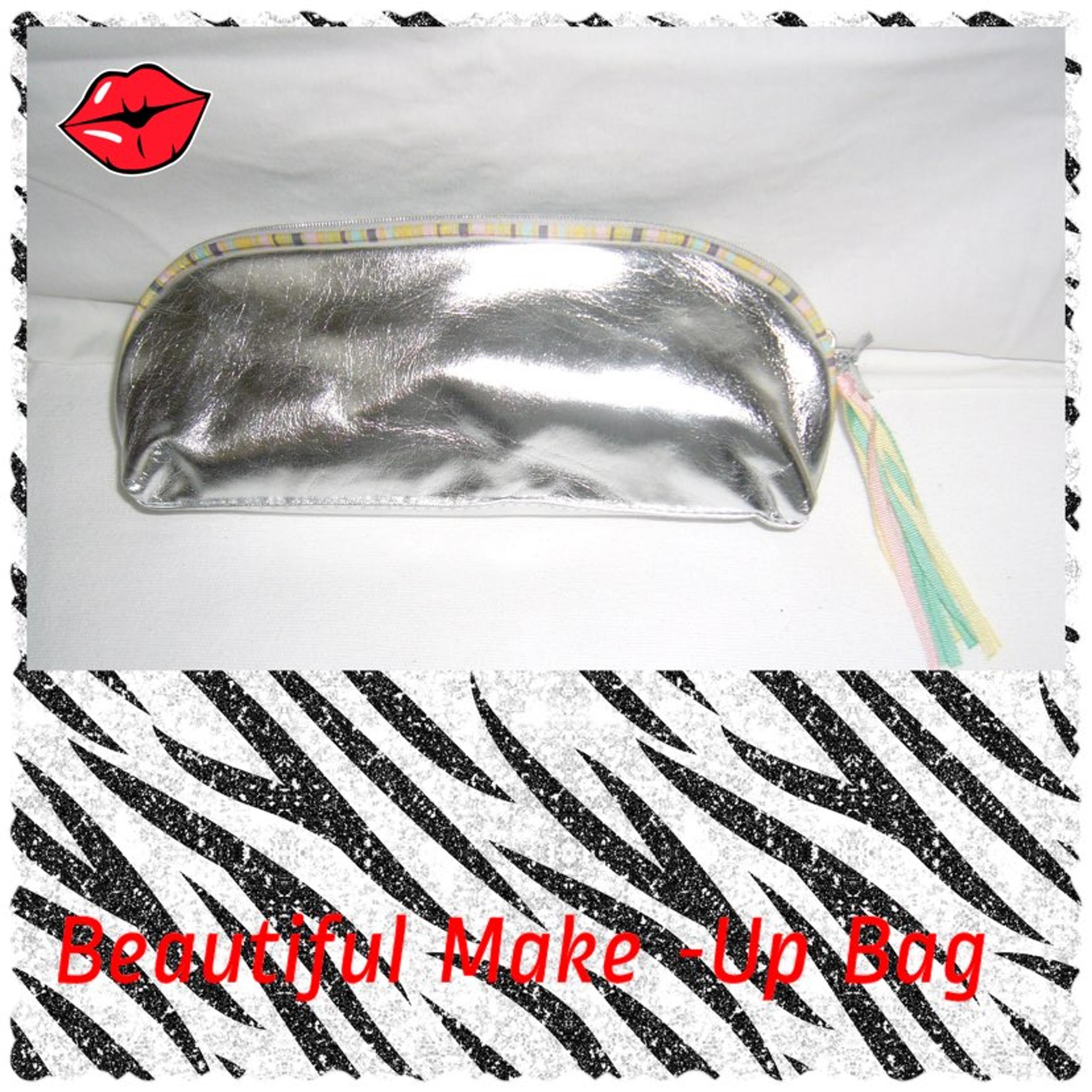 Avon Metallic Silver Make-Up Bag new