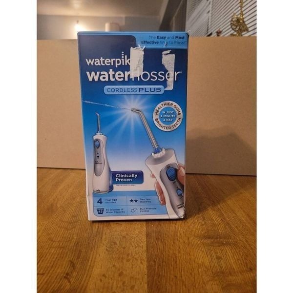 Waterpik Cordless plus portable flosser Oral irrigor new in box sealed plastic