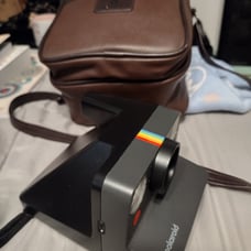 Polaroid Camera with film and Case