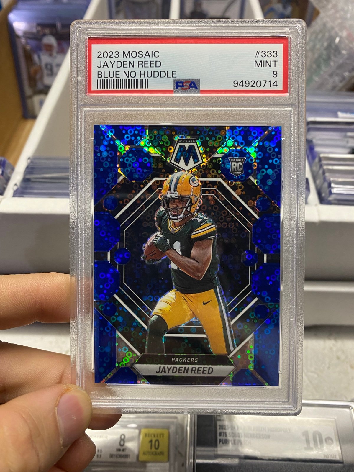 JAYDEN REED Rookie Prizm BLUE DISCO /99 2023 Panini Mosaic Football PSA 9 NFL SP