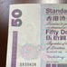 50 DOLLARS UNC BANKNOTE BRITISH HONG KONG STANDARD CHARTERED BANK Jan 1 1998