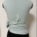 A light blue top by Nina Ricci.