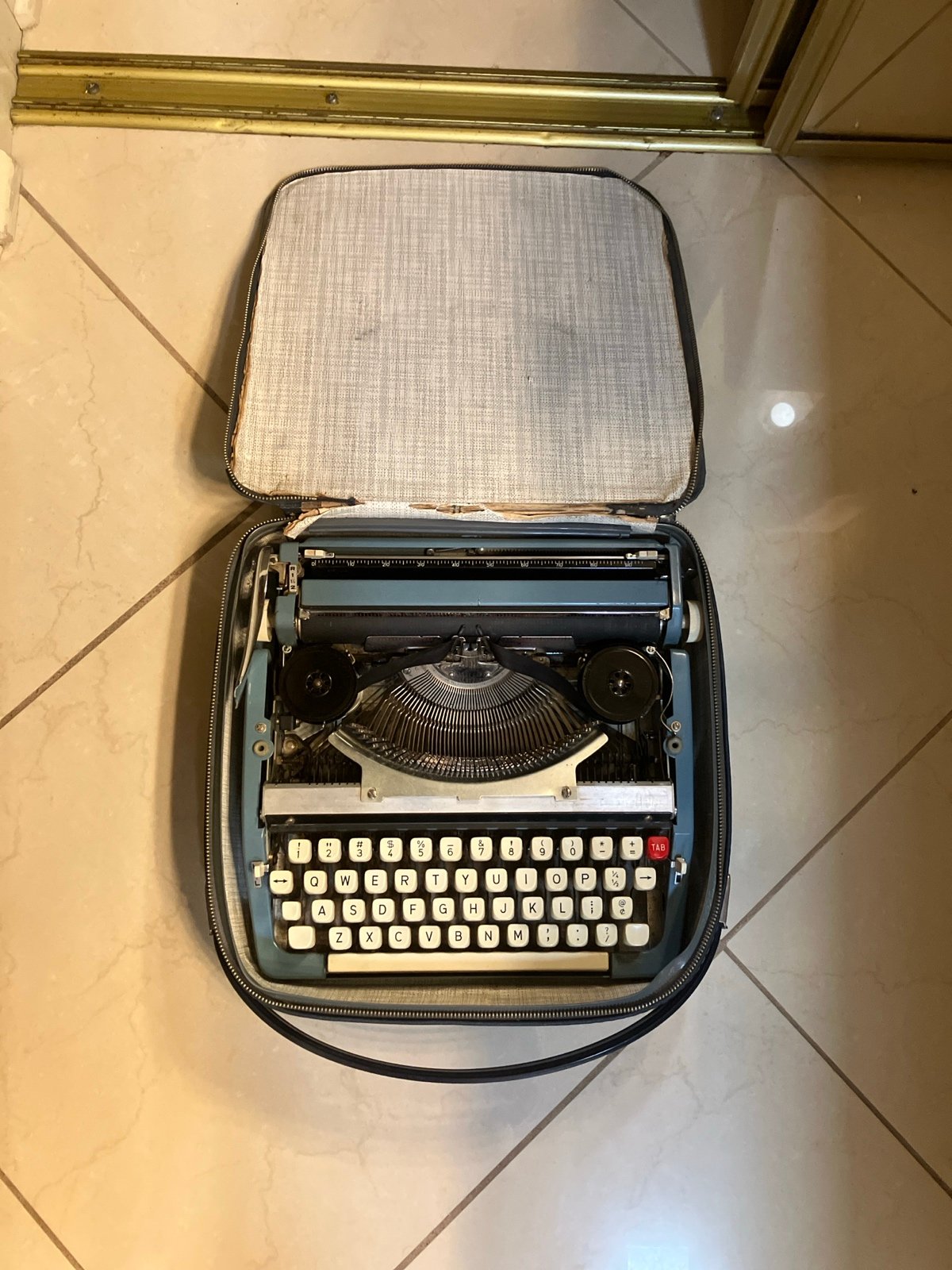 antique brother typewriter in case