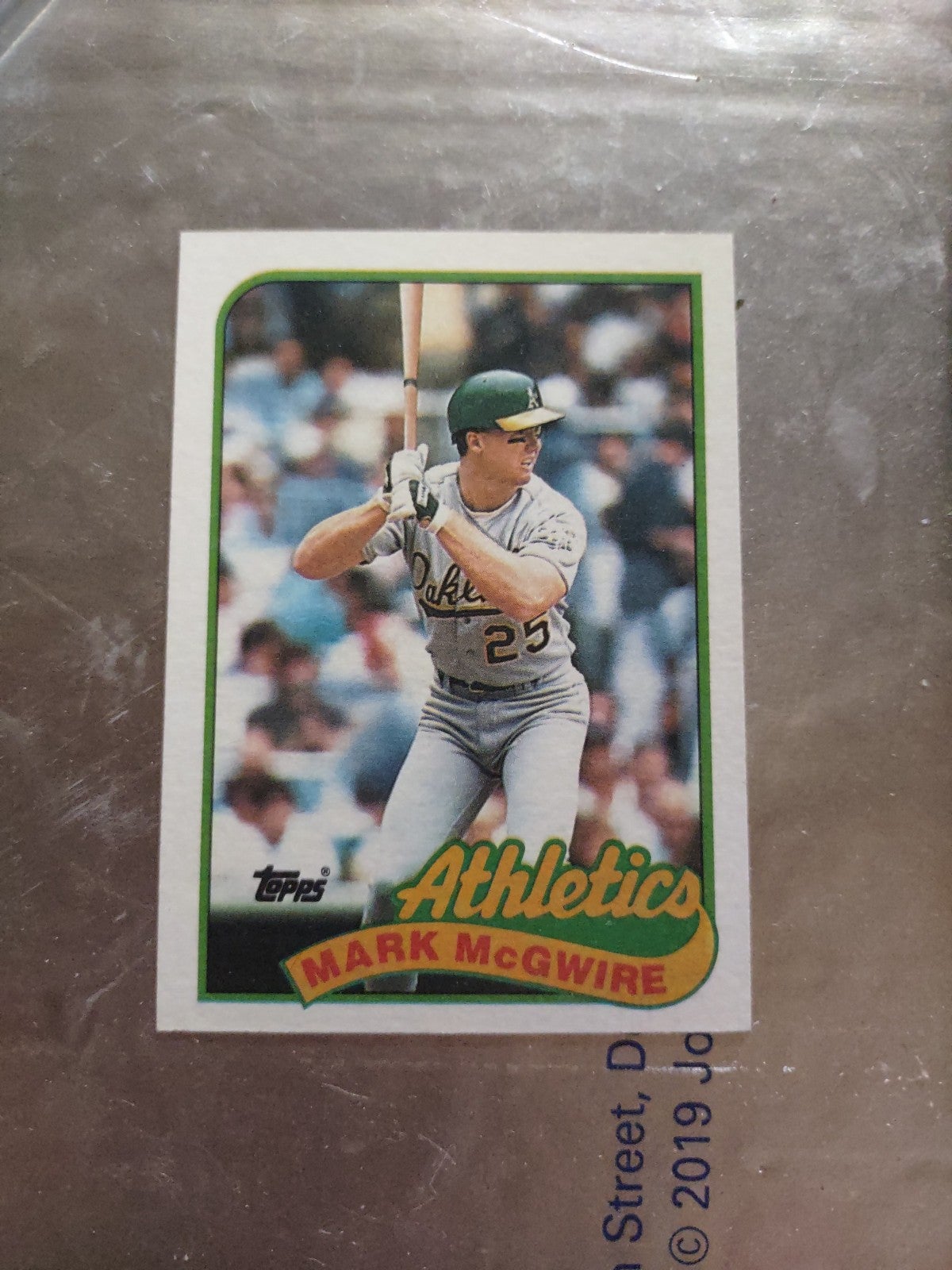 1989 Topps Mark McGwire error card slugging % and weight should be 225
