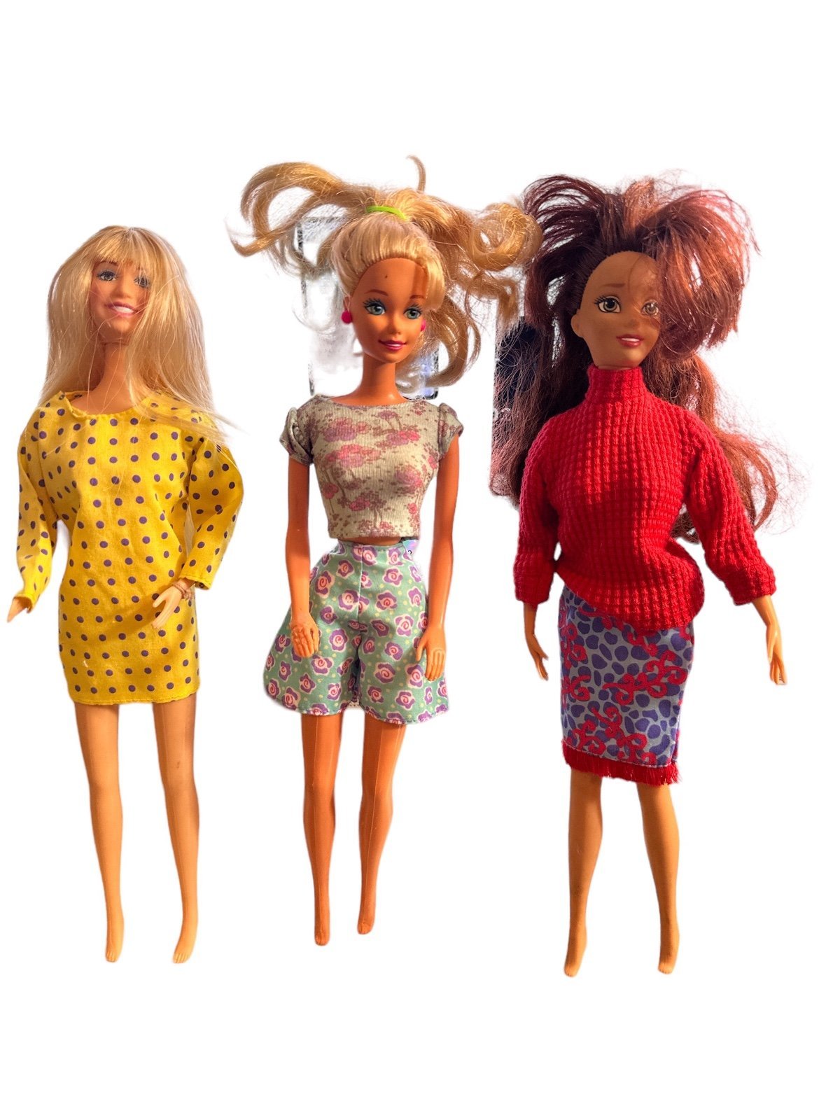 3 Barbie’s for the price of one you have a 1966 and Hannah Montana and Disney