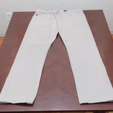 AG Adriano Goldschmied Men's Jean. Color Cream. Size 38X34.