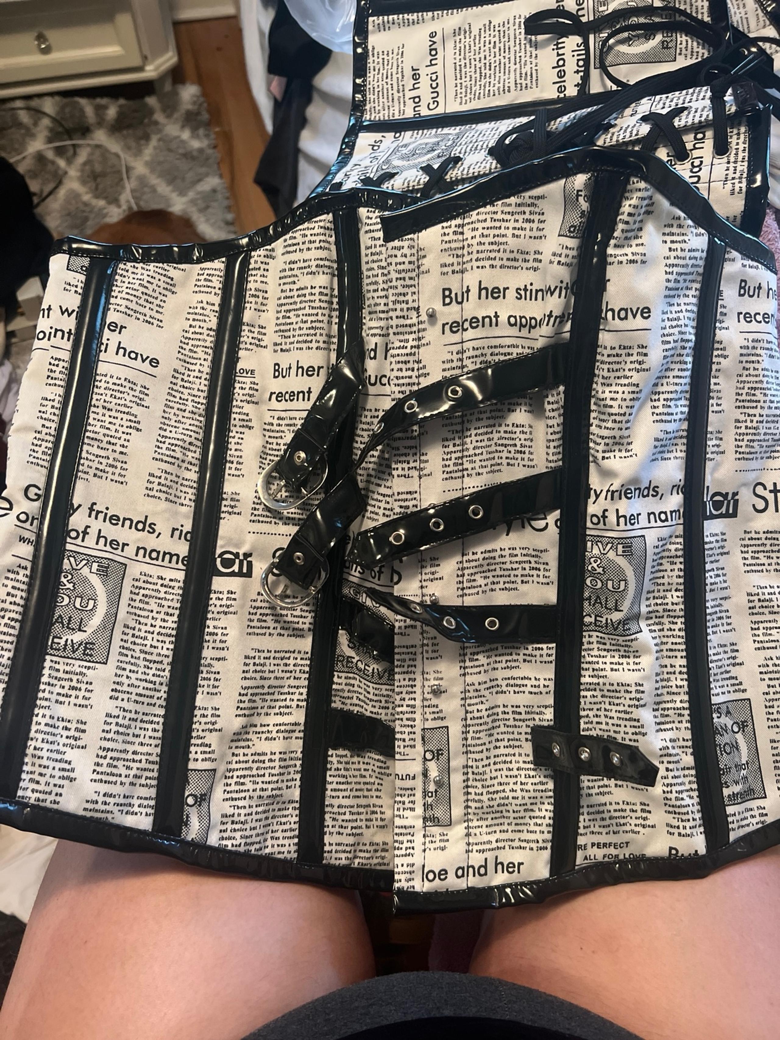Newspaper print corset.
