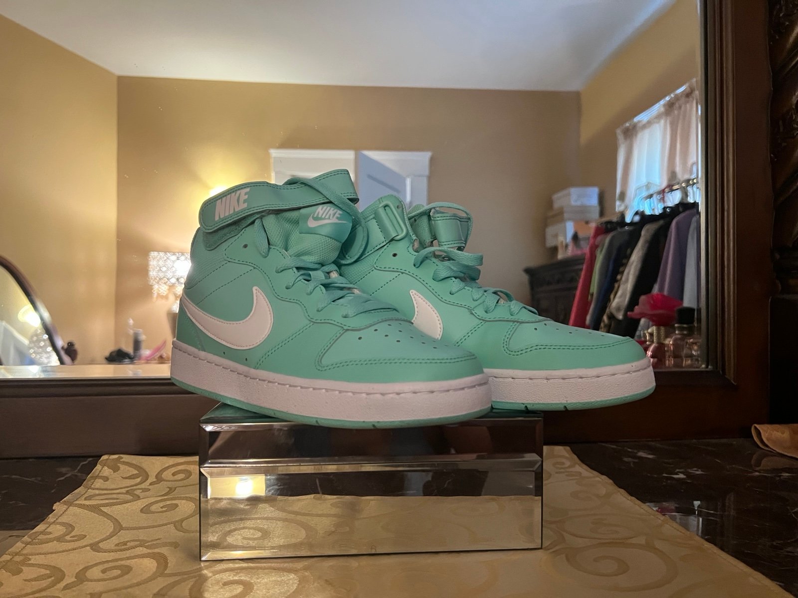 Mint green men size 7 high top Nike tennis shoes