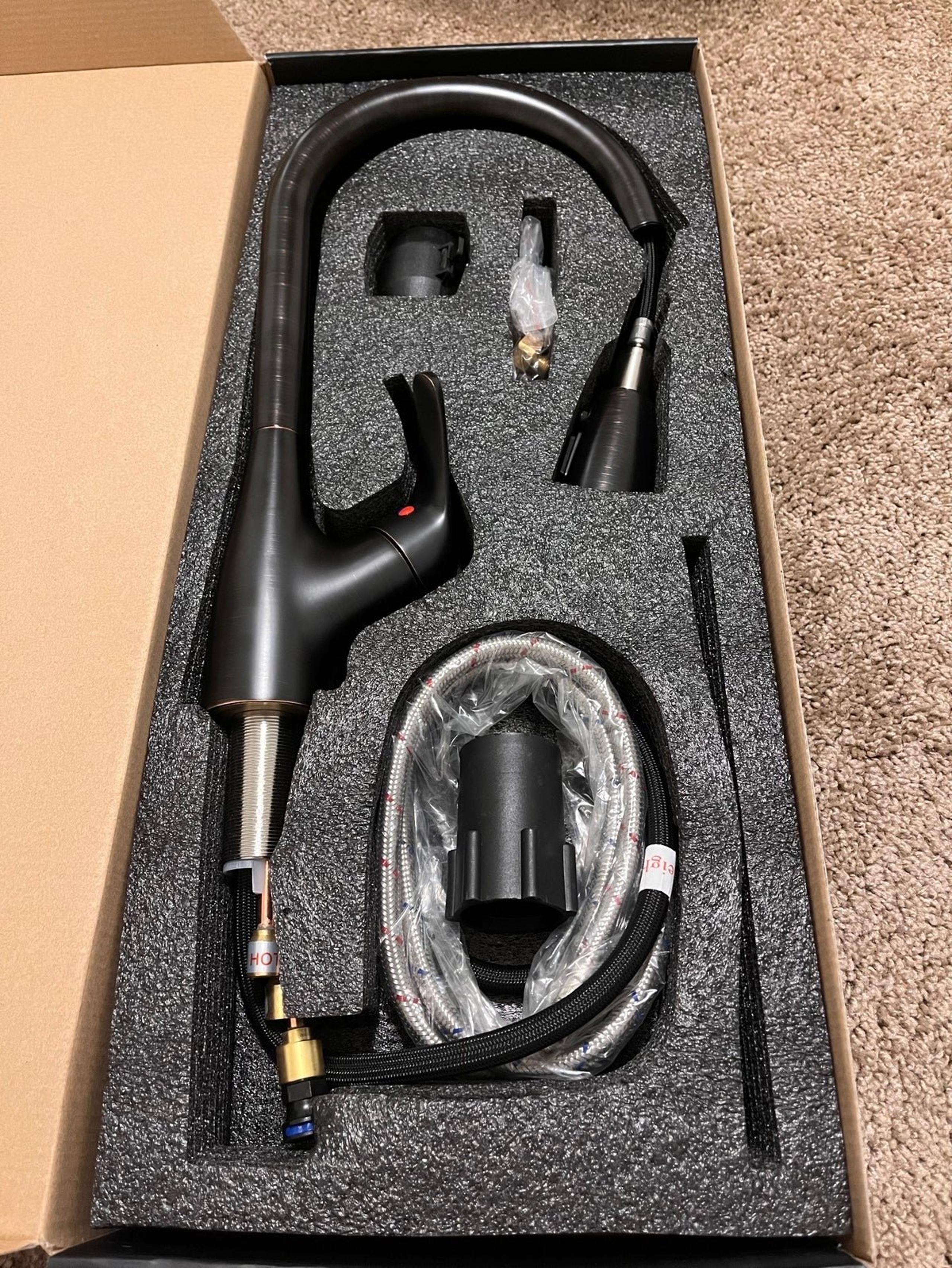 New pull down sink faucet