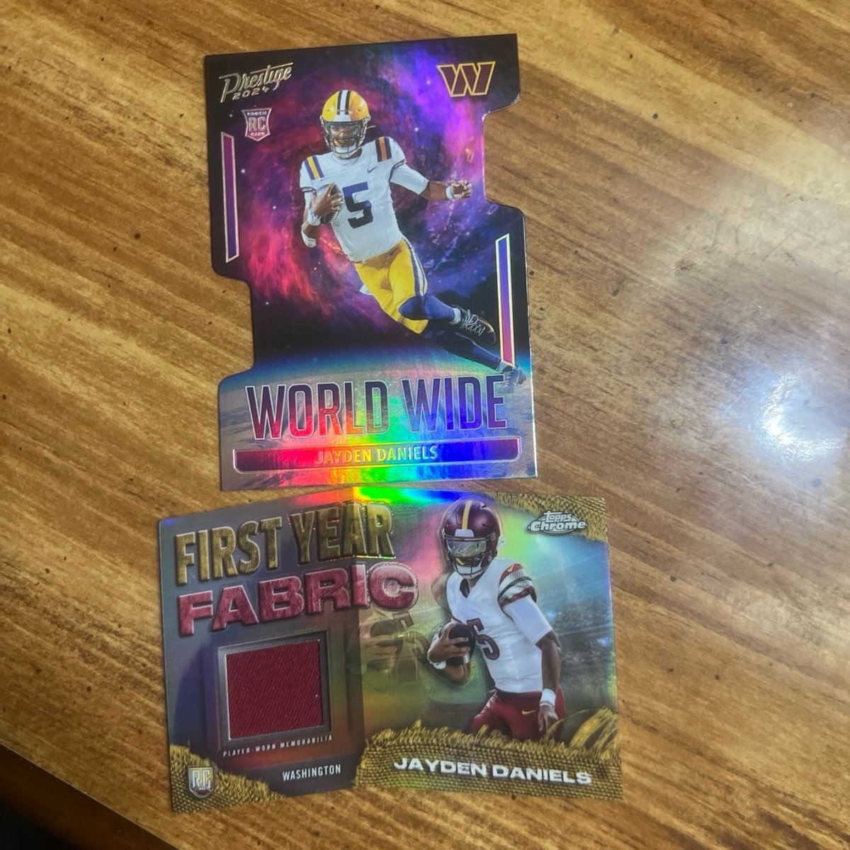 JAYDEN DANIELS 2 CARD LOT SSP ROOKIE CARDS. FIRST YEAR FABRIC and PRESTIGE RC
