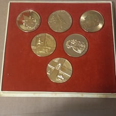 Papel gold plated coins