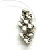 Sterling silver wonton shaped beads. Sv24