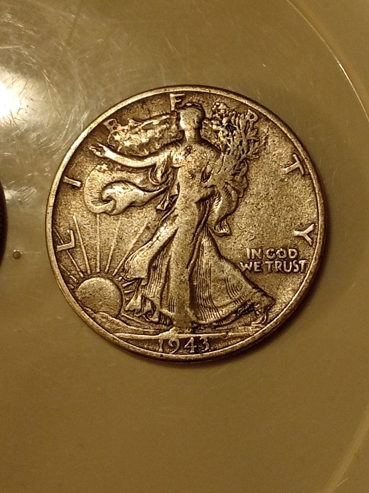 A1943 and a 1947 half walking liberty