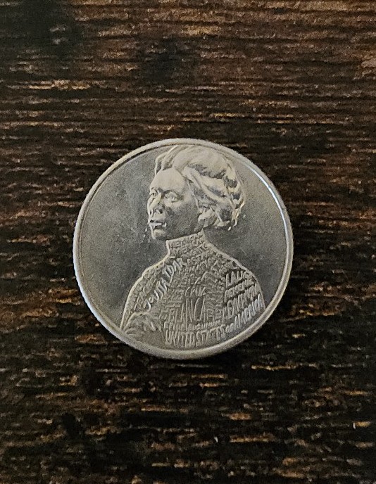 ERROR - 2023 D - Jovita Idar Women's Quarter Reads “In Cod We Trust” Cross Mark