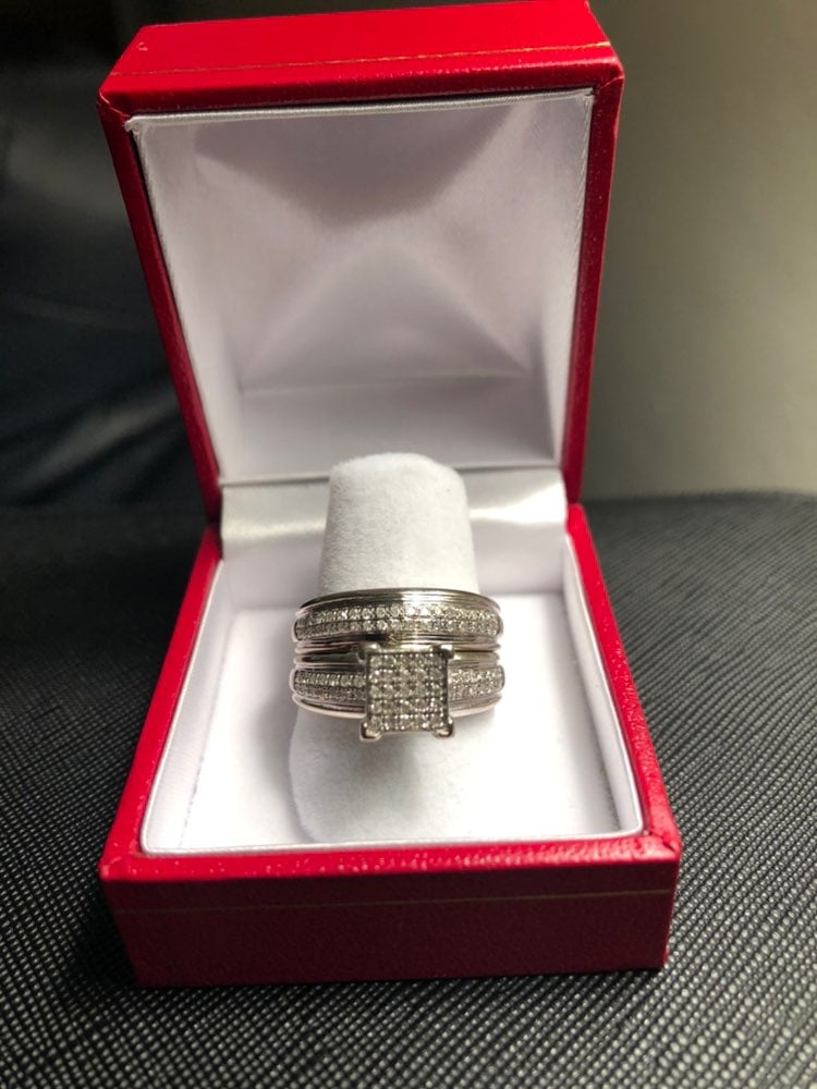 White gold ring with small diamonds.