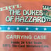 The Dukes of Hazzard carrying case and 13 ERTL cars