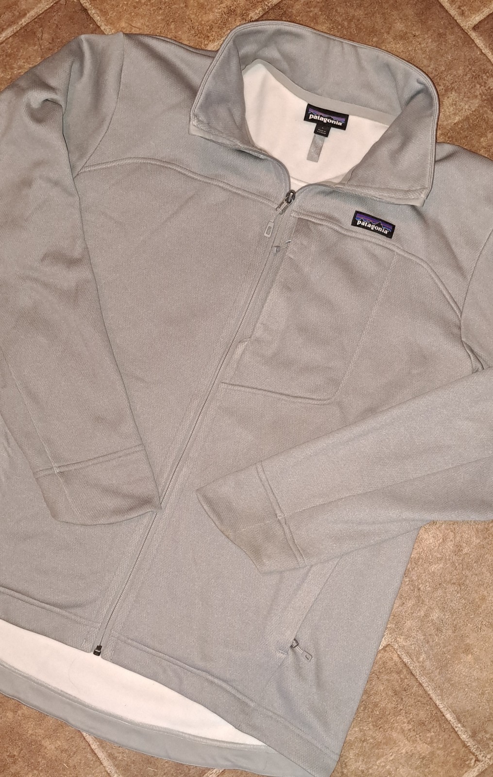 Nice Patagonia Jacket Size Large Worn Wear Great Condition Light Grey