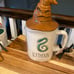 2 Rae Dunn Harry Potter SLYTHERIN mugs Hat Topper and New Wider style