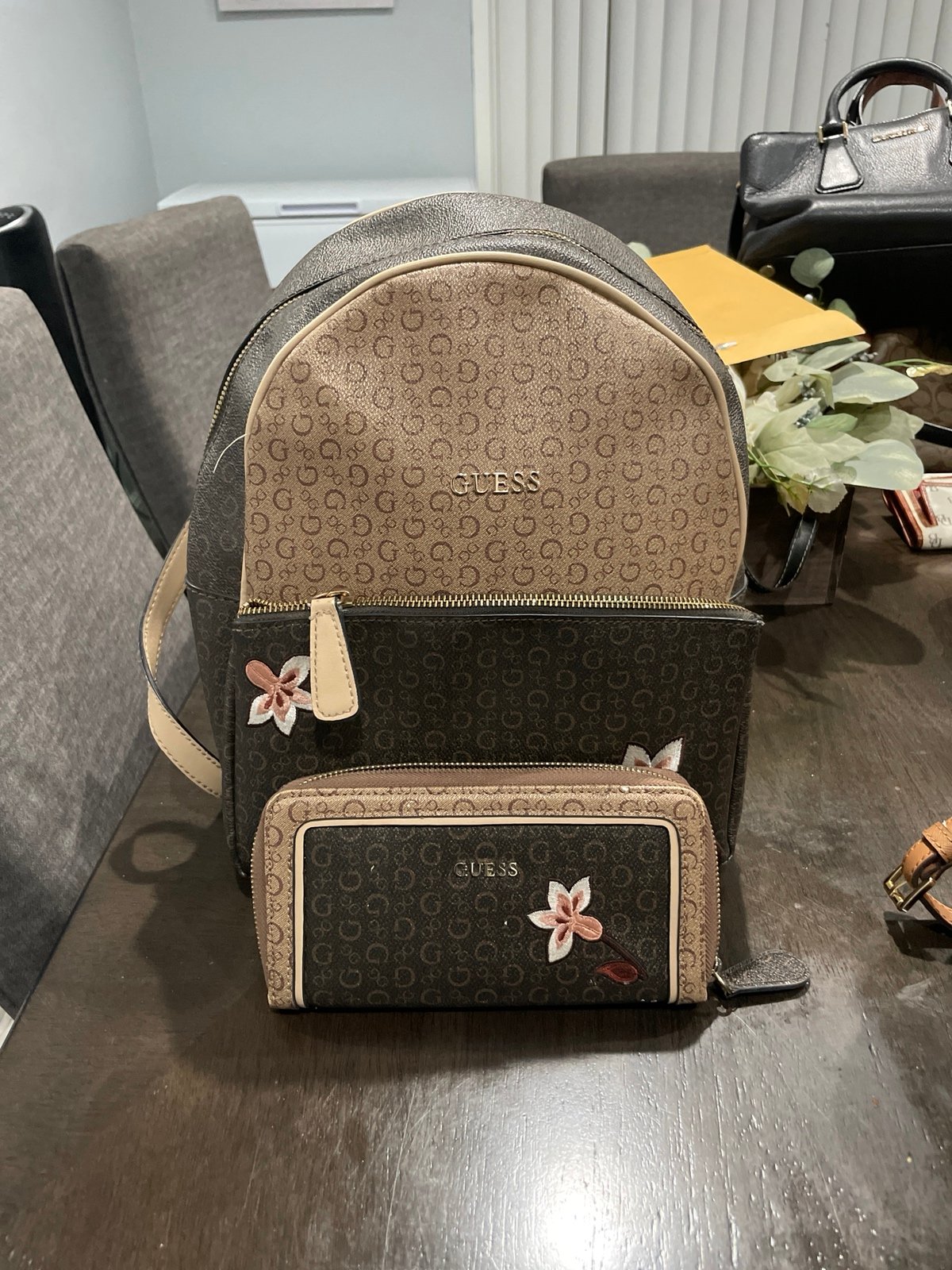 Guess backpack and wallet