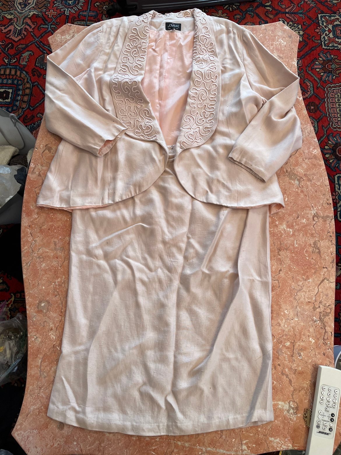 Women’s Jovanni light pink blazer and skirt sets size 18. And preowned conditio