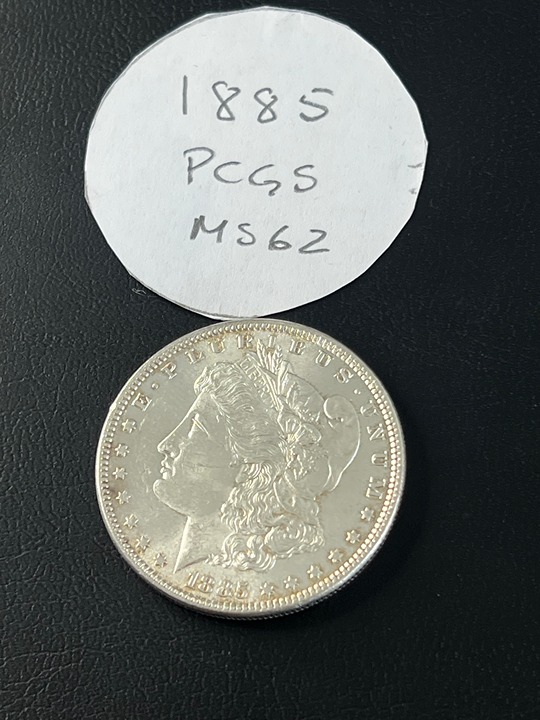 1885 Morgan Silver Dollar - 90% Silver (PCGS MS62 label)